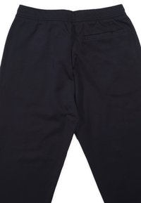 Zwarte sweatpants gemaakt van een zachte katoenmix, met een elastische tailleband en een enkele achterzak met een minimalistisch ontwerp.