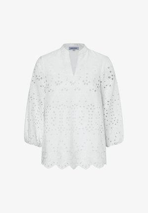 White long-sleeve blouse with eyelet floral patterns, V-neck, elastic cuffs, and scalloped hem, displayed on a plain background.