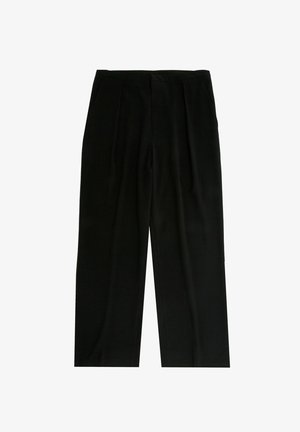 Pantalon large noir en tissu texturé, avec des plis à l'avant et une ceinture lisse. Pas de poches visibles ni d'ornements.