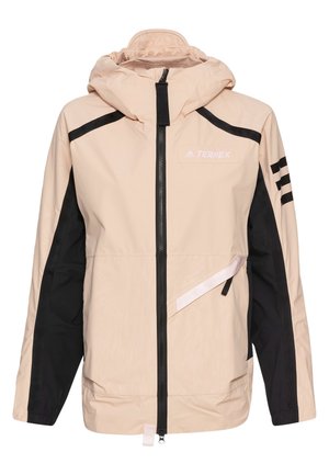 Veste rose clair avec accents noirs, tissu résistant à l'eau, fermeture éclair complète, capuche ajustable, logo sur la poitrine et détail de poche diagonale.