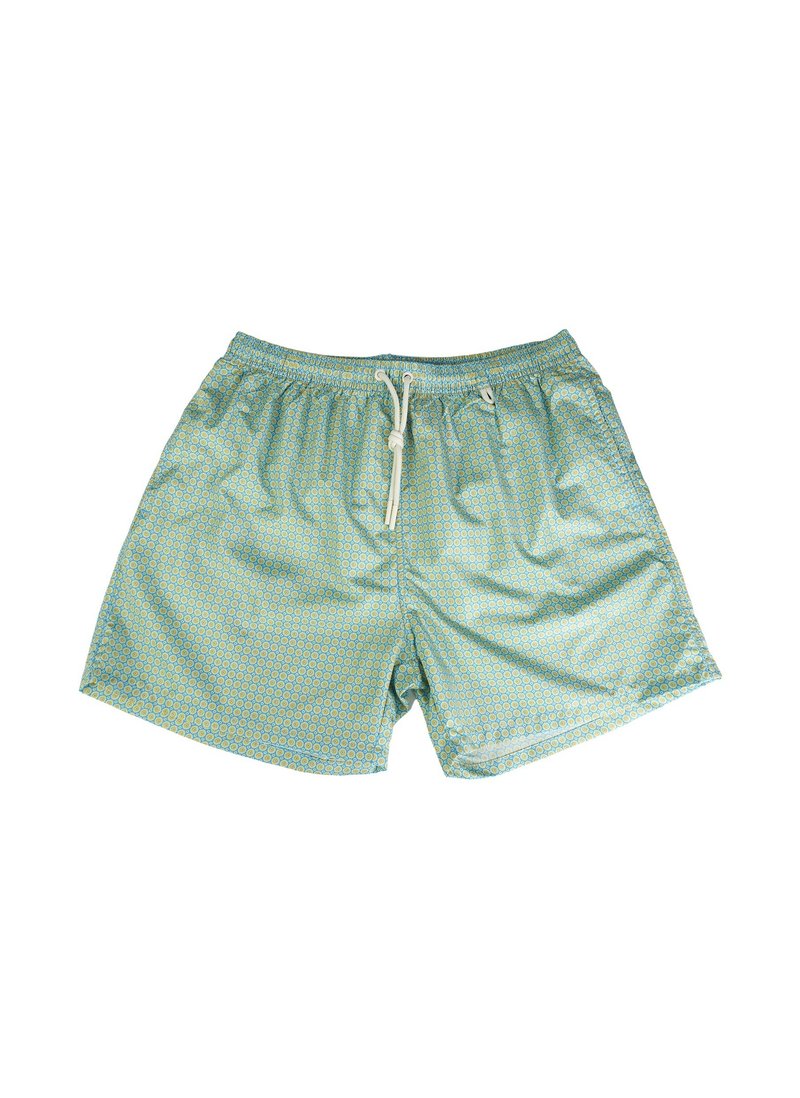 Costumi da bagno stampati in verde chiaro con un tessuto testurizzato, dotati di vita con cordino e piccoli disegni circolari su tutta la superficie.