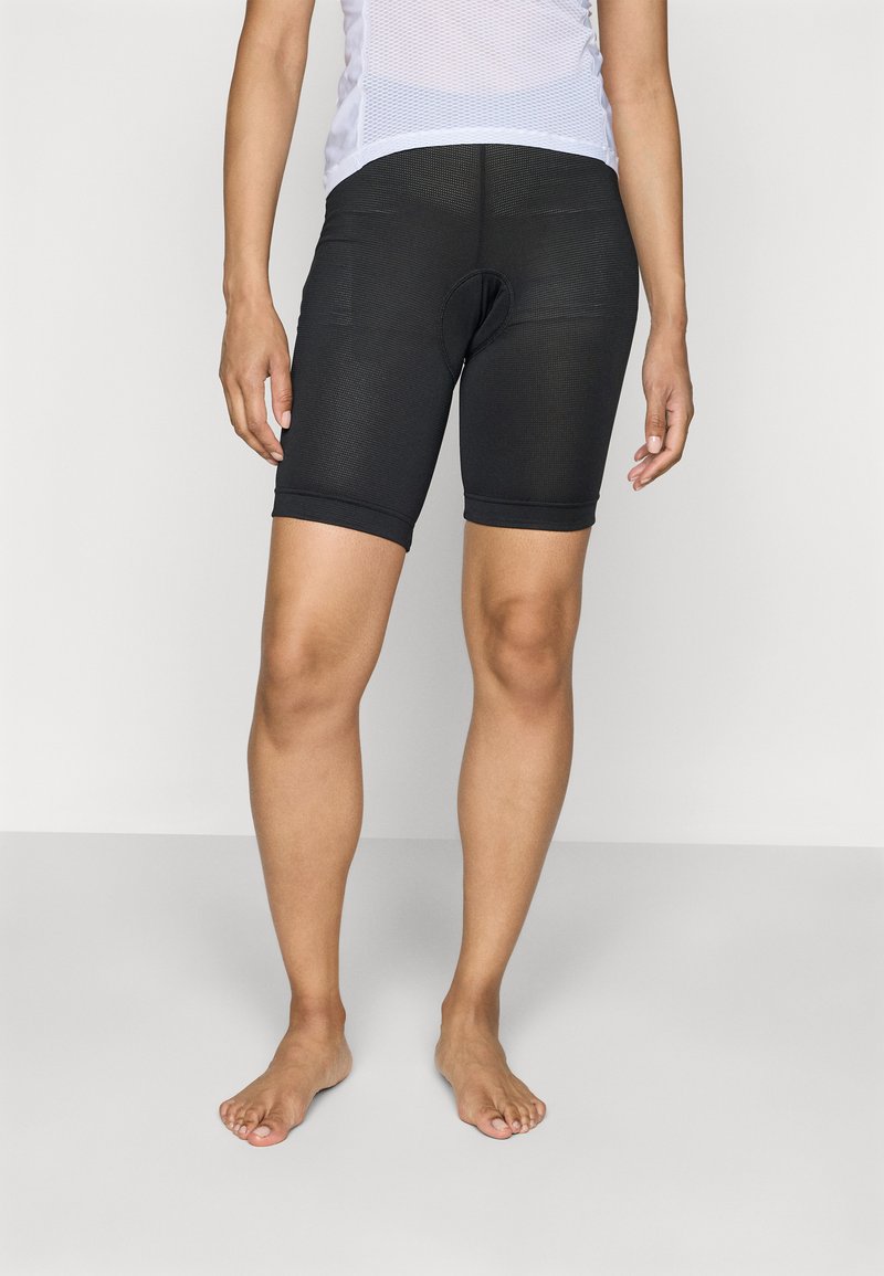 Schwarze Radsportshorts mit einer figurbetonten Passform, glattem Stoff, Mittellänge bis zum Oberschenkel und einer gepolsterten Einlage für mehr Komfort während der Fahrten.