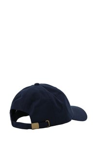 Navy blue baseball cap with a curved brim, made of cotton fabric. Features a brass adjustable strap at the back and a fabric button on top.