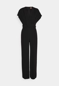 Combinaison noire sans manches avec haut cache-cœur à encolure en V, taille cintrée, pantalon à jambes larges, et fermeture éclair au dos.