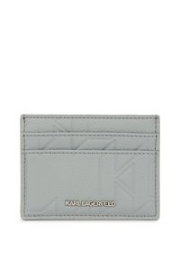 Gray leather cardholder featuring embossed geometric design, multiple card slots, and silver-tone branding. Smooth texture with stitched edges.