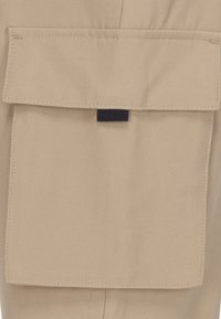 Jordan JORDAN POST UP - Pantalon cargo - hemp