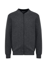 Czarna, szara bomberka wykonana z miękkiego, teksturowanego materiału. Posiada zamek z przodu, prążkowane mankiety oraz stojący kołnierz. Nie widoczne są żadne kieszenie.