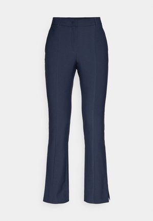 Nabrane mornarskoplave hlače s širokim nogavicama, glatke teksture, s prednjim naborima i bočnim prorezima na gležnjevima.