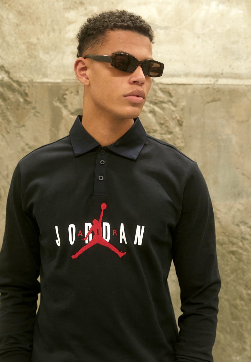 Jordan RUGBY Polo shirt black/black/black/(gym red)/black Zalando