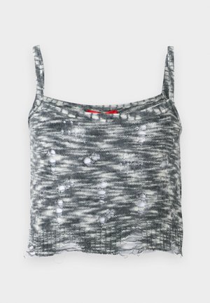 Gray knitted cropped tank top with thin straps, featuring a distressed design with multiple holes and a loose hem. Red accent at the neckline.