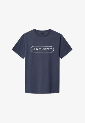 Marineblå bomulds T-shirt, rund hals, kortærmet, med et sølvfarvet ovalt logo med teksten "HACKETT" i fed skrift.