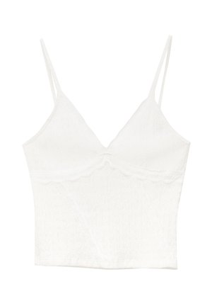 Camisole blanche avec bretelles fines, tissu texturé, décolleté en V et détails en dentelle au niveau de la poitrine et de l'ourlet. Design basique et ajusté.