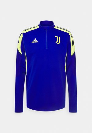 Pitkähiha sininen jalkapalloharjoituspaita keltaisilla yksityiskohdilla, Adidas-logo oikealla rinnalla ja Juventuksen logo vasemmalla rinnalla, etuvetoketjukuja.