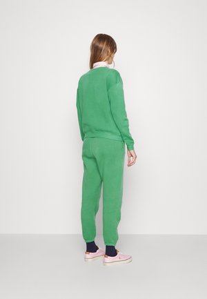 Pantalones deportivos - green