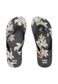 Zwarte flip-flops met een witte bloemenprint en oranje accenten; gestructureerde voetbed en zwarte rubberen banden met logo-detail.