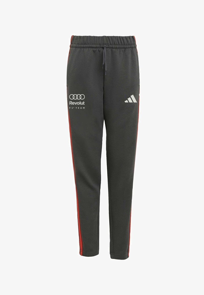 Pantalones deportivos Adidas gris oscuro con franjas laterales rojas, cintura elástica y logotipos de "Audi Revolut F1 Team" en la parte delantera.
