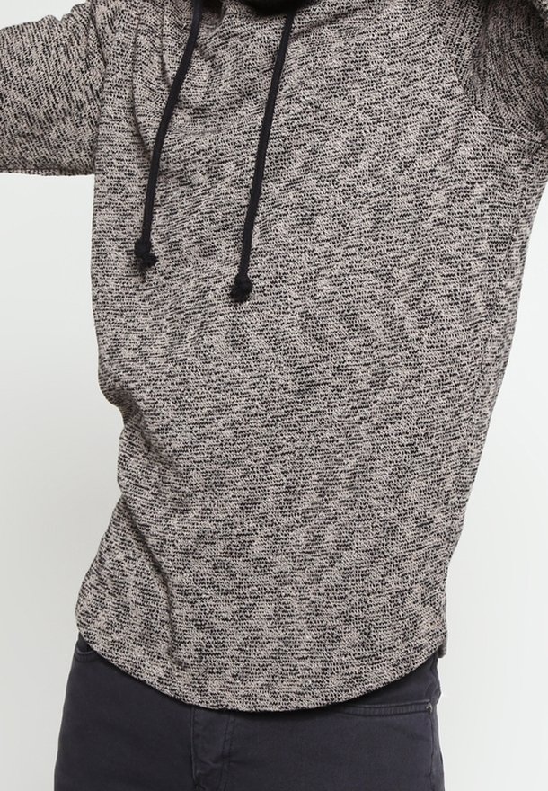 Harsoharmaa huppari, joka on valmistettu pehmeästä kankaasta ja jossa on naruilla säädettävä huppu sekä pyöristetty helma rentoa istuvuutta varten.