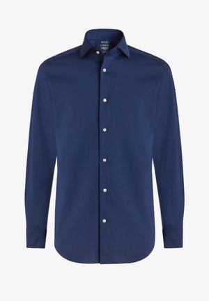 Marineblauwe lange mouwen shirt van gladde stof, met een standaard kraag, voorwaartse knoopsluiting en knoopmanchetten.