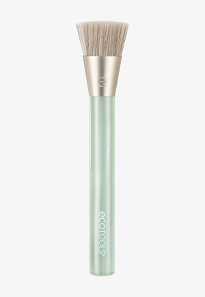 Brocha de maquillaje con cerdas beige, férula metálica con el logo "e" y un mango verde claro etiquetado con "ecotools."