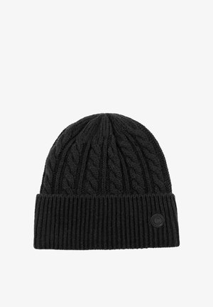 Black knitted beanie hat with a folded ribbed cuff and cable knit pattern, featuring a small circular logo on the cuff's lower right side.