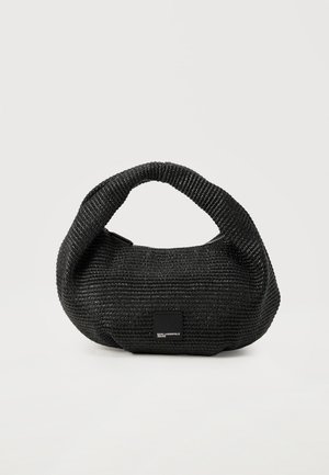 Črna tkanina ročna torba z zaobljeno zgornjo ročico in majhno pravokotno značko logotipa Karl Lagerfeld Jeans na sprednji strani.