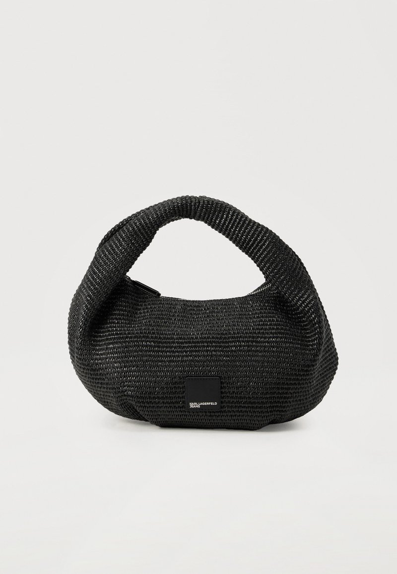 Μαύρη υφαντή τσάντα χειρός με στρογγυλή πάνω λαβή και μικρό ορθογώνιο λογότυπο Karl Lagerfeld Jeans στο μπροστινό μέρος.