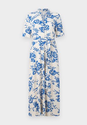 Kratke rukave haljina od kremaste tkanine s plavim cvjetnim uzorkom, gumbe sprijeda, pojasom u struku i dužinom do koljena. Standardni dizajn ovratnika.