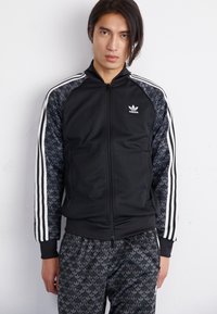 adidas Originals - Trainingsjacke - black Thumbnail-Bild 1