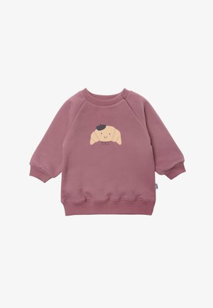 Rosa Sweatshirt mit langen Raglanärmeln und gerippten Bündchen. Auf der Vorderseite befindet sich ein Cartoon-Croissant-Design.