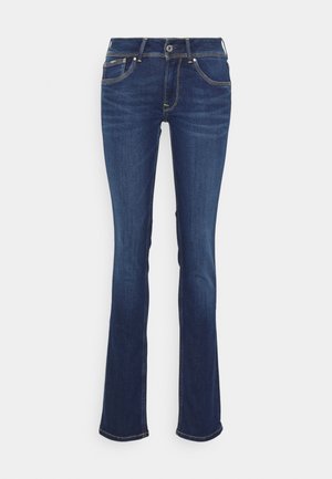 Dark blue denim flared jeans with a mid-rise waist, five pockets, yellow stitching, and a button closure at the front.