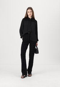 Elisabetta Franchi PANTS - Nadrágok - nero