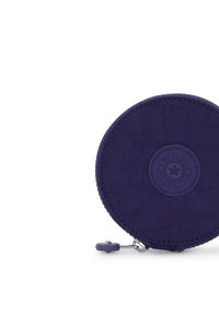 Round purple wallet made of textured fabric, featuring a circular embossed logo, a zip closure, and a small keyring attachment.