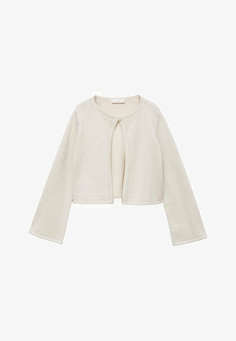 Svijetlosmeđa skraćena kardigana izrađena od mekanog pletenog materijala. Ima okrugli izrez, duge rukave s flared rezom i dekorativne šavane detalje.