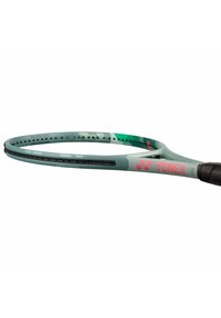 Yonex tennis racket with a green and grey frame, isometric design, black grip, and pink logo. Features a textured handle and ventilation holes.