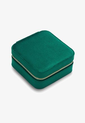 Groene stofomhulde vierkante tas met een gouden rits, met een zachte textuur en afgeronde randjes, geschikt voor opslag of reizen.