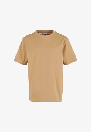 Beiges Baumwoll-T-Shirt mit Rundhalsausschnitt und kurzen Ärmeln. Weiche Textur, reguläre Passform, ohne Muster oder Grafiken, schlichtes Design.