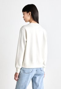 Calvin Klein Jeans INSTITUTIONAL GRAPHIC - Melegítőfelső - ivory