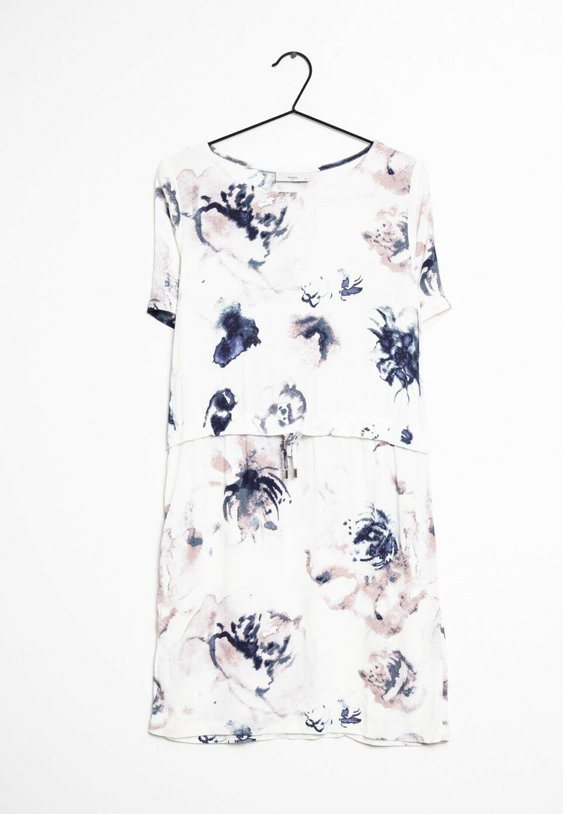 Abito a stampa floreale bianco, con scollatura rotonda, maniche corte e vita arricciata con cordoncino. I colori includono blu navy e rosa pallido.