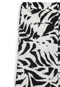 Schwarz-weiße gemusterte Hosen aus glattem Leinenstoff, mit einem abstrakten Zebra-Design und einem einzelnen Gesäßtaschen-Detail.