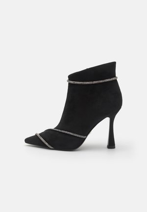 Botines de tacón - black