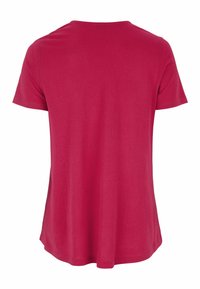 T-paita lyhyillä hihoilla kirkkaan pinkissä kankaassa. Ominaisuuksiin kuuluu pyöreä kaula-aukko ja löysä istuvuus, suora helma alhaalla.