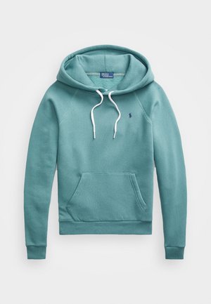 Modré pulovrové tričko na přehození s bílými šňůrkami na kapuci, předními kapsami typu klokan, žebrovanými manžetami a malým vyšitým logem na hrudi.