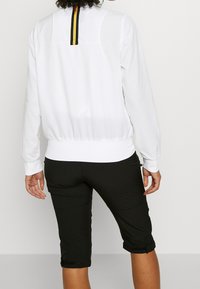 Icepeak Chaqueta de entrenamiento - white