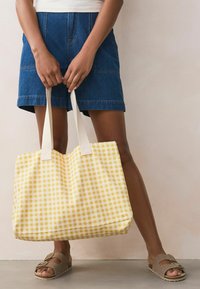 Next REUSABLE - Rankinė - yellow