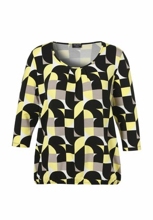 Damesblouse met lange mouwen, ronde hals, plooi-detail en geometrisch patroon in zwart, geel, beige en wit.