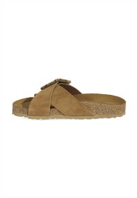 Sandale à glissière en suède marron avec des brides croisées et une boucle texturée. Comprend un semelle intermédiaire en liège et une semelle extérieure en caoutchouc texturé pour une meilleure adhérence.