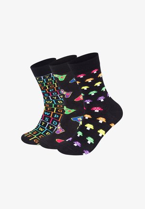 Three pairs of black socks featuring colorful patterns: video game icons, mushrooms, and a grid of letters and colors. Cotton blend material.