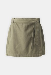 Khaki wrap skirt made of textured cotton fabric. Features a tied waist and an A-line shape, with a clean hemline and side pockets.