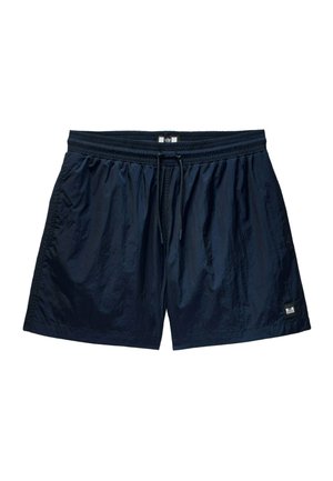 Navy blue swim shorts made of lightweight material, featuring an elastic waistband with a drawstring and a small logo on the lower hem.