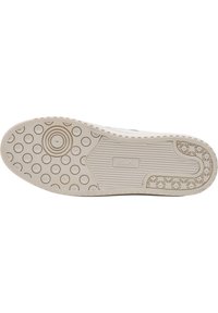 Sneakersula i ljusbeige gummi med cirkulära och linjära mönster. Har en strukturerad yta och varumärkesdetalj vid hälen.